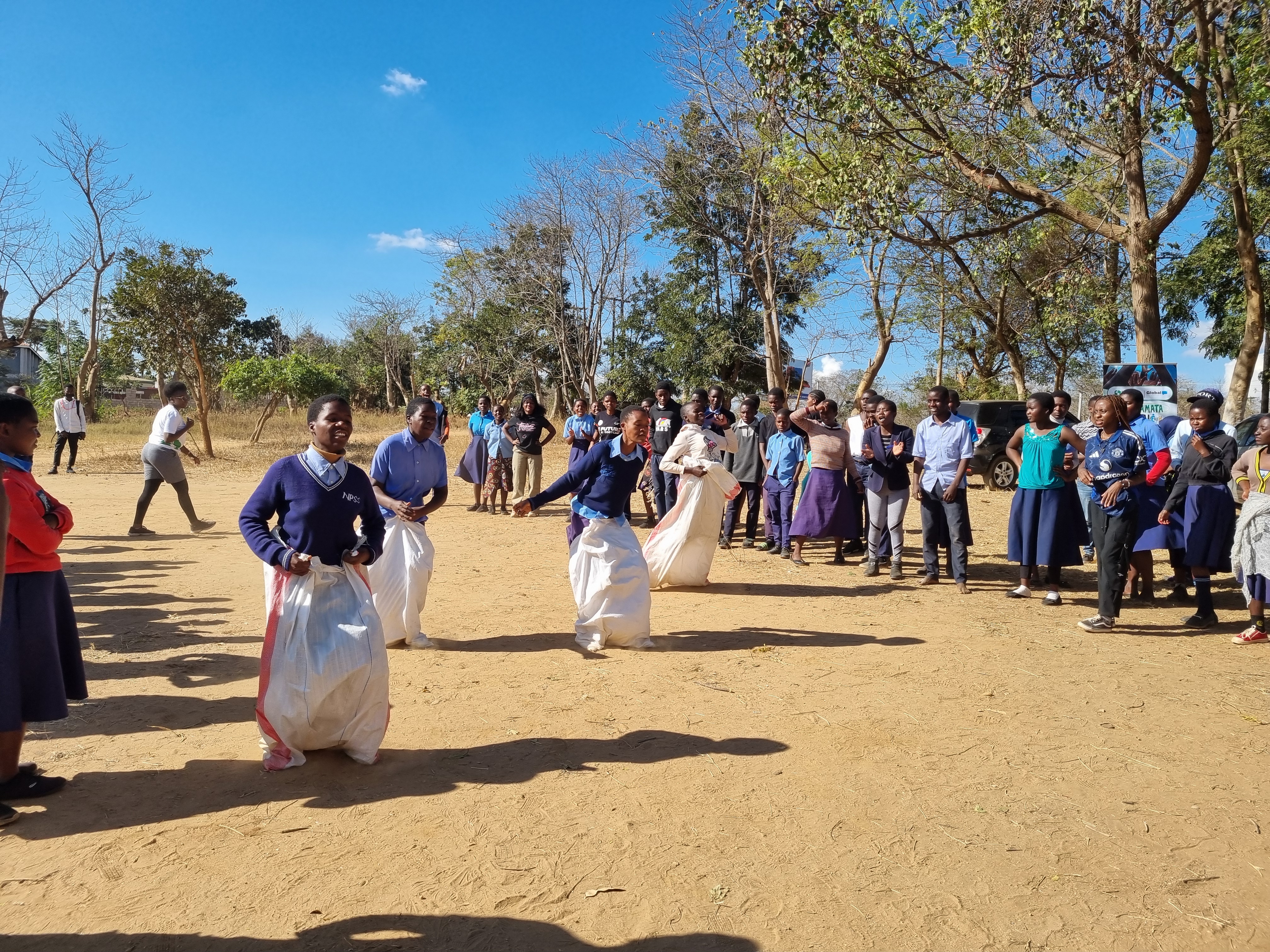 Rugare facilitators with students after a club session